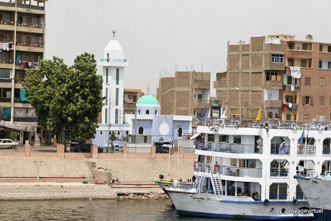Painted mosque reaching the village of Edfu - Egypt