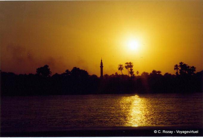 The sun sets on the minaret of Esna - Egypt
