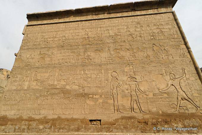 Reliefs depicting Khnum and Neith with a lion's head against the pharaoh, Esna Temple - Egypt
