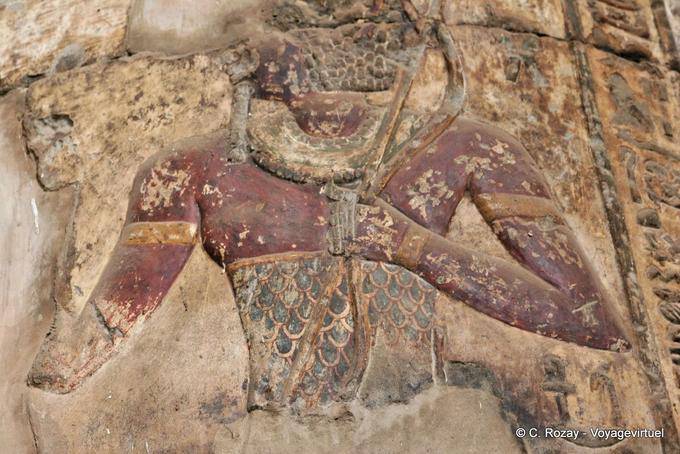 Polychrome relief bust on a column of the Hypostyle Hall, Temple of Esna - Egypt