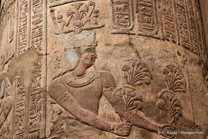 Pharaoh with bouquets of flowers, painted relief, Esna Temple - Egypt