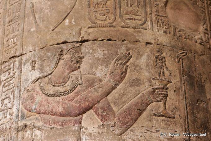 Color pharaoh making an offering to the barrel of a column Esna Temple - Egypt