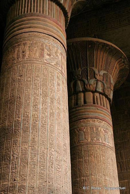 Columns with inscriptions describing the ceremonies taking place inside the temple of Khnum, Esna - Egypt