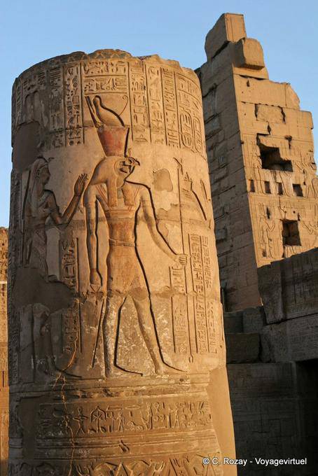 Horus and TasetNofret, color bas-reliefs on a truncated column temple of Kom Ombo - Egypt