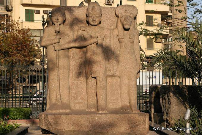 Triad Egyptian gods in the garden of the Egyptian Museum, Cairo - Egypt