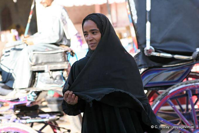 Smiling woman in traditional black, Luxor - Egypt