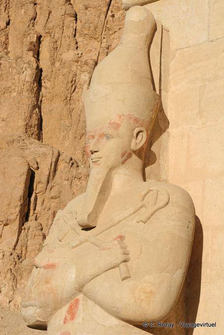 Osirian colossus, left corner of the upper terrace temple of Hatshepsut - Egypt