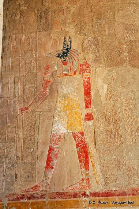 Color representation of Anubis, the funerary god master of cemeteries and embalmers, Hatshepsut Temple - Egypt