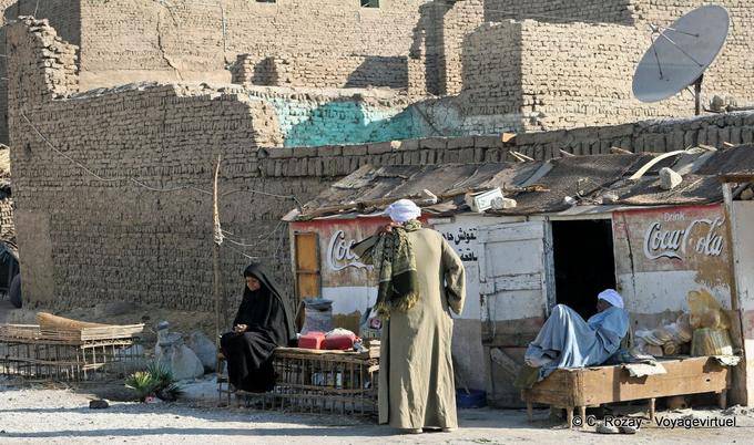 Fellah and woman in black Kurna old Qurna - Egypt