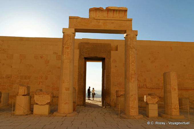 Door in pink granite, called Amon the splendid monuments, view from inside the courtyard behind the third frame, Hatshepsut Temple - Egypt