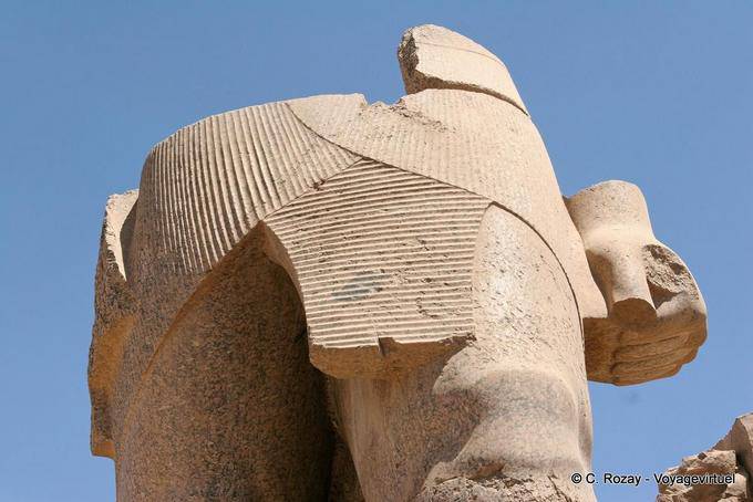 Focus on the fragment of a colossal sculpture, Karnak Temple - Egypt