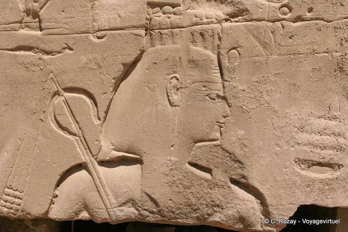 King holding the stick or cross heka with the flagellum, Karnak - Egypt