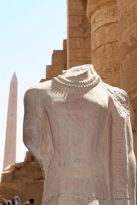 Headless statue wearing a necklace, Karnak Temple - Egypt