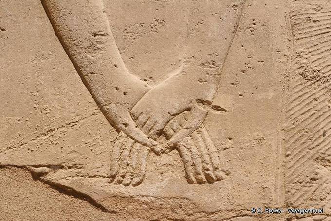 Elegance of Egyptian art, hands meet, Karnak - Egypt