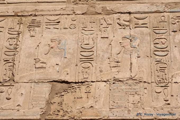 Color marks on sat holding the Pharaohs was scepter, emblem of the nome of Thebes, Karnak - Egypt