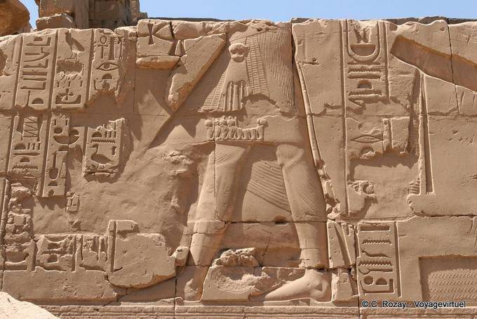 Bas Pharaoh costume surrounded by hieroglyphics, relief, Karnak - Egypt