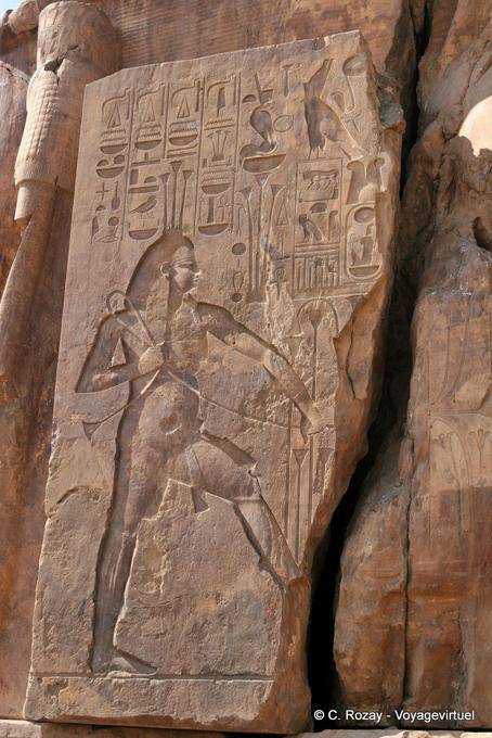 God Nile tying the papyrus to unify the two Egypts, beside the throne, Memnon - Egypt