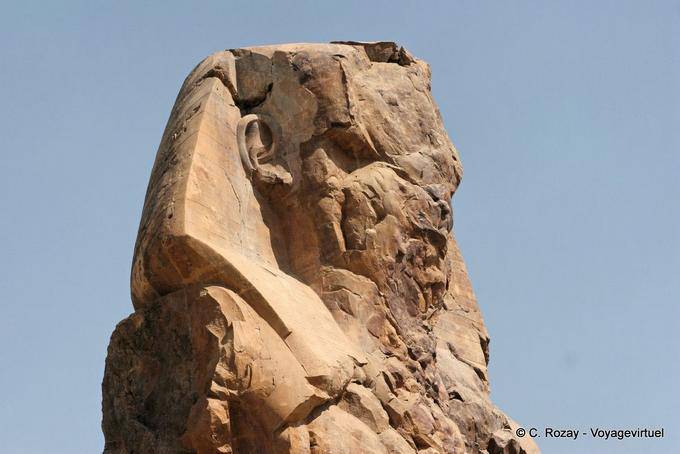 Broken side bearing the Nemes, Colossus of Memnon - Egypt