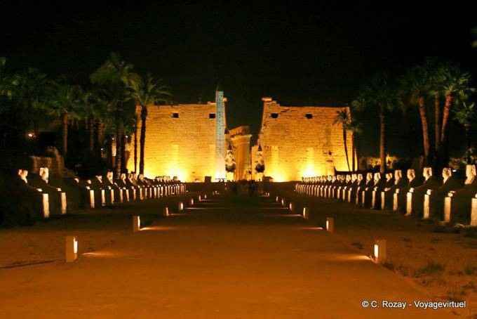 Night panorama of the dromos and the pylon of Ramses II, Luxor - Egypt