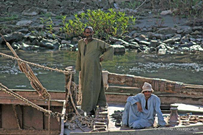 Nile fellahin on a passing ship - Egypt