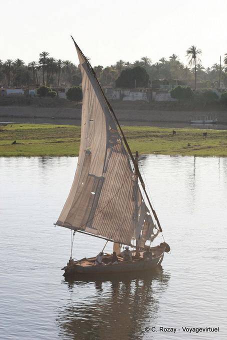 Felucca sailing with patched, Nil - Egypt