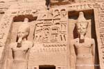 Hieroglyphics and statues of Ramses II, facade of the Temple of Queen Nefertari, Abu Simbel, Egypt.