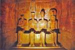 Statues of the sanctuary, from left to right Ptah (Memphis), Amun-Ra (Thebes), Ramses II and Ra-Horakhty (Heliopolis), Great Temple, Abu Simbel, Egypt.