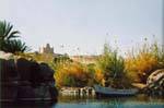 The Mausoleum of the Aga Khan seen from the Nile, Aswan, Egypt.