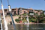 Aswan, Old Cataract Hotel seen from the river, Egypt.