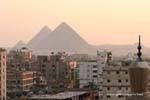 Sunset on the Giza necropolis from the city of Cairo, Egypt.