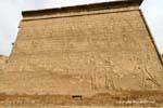 Reliefs depicting Khnum and Neith with a lion's head against the pharaoh, Esna Temple, Egypt.