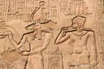 Relief of the facade, Khnum Osiris and another god, Esna Temple, Egypt.