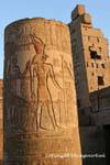 Horus and TasetNofret, color bas-reliefs on a truncated column temple of Kom Ombo, Egypt.