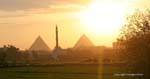 The minaret between the pyramids at sunset, Cairo, Egypt.