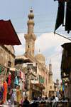Minaret and dome of the Mosque Khan el-Khalili, view from the souk, Cairo, Egypt.