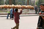 Cairo, wooden plate on the head of the wearer of bread, Egypt.