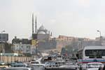 In traffic, at the foot of the Citadel, Cairo, Egypt.