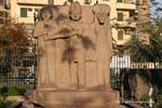 Triad Egyptian gods in the garden of the Egyptian Museum, Cairo, Egypt.