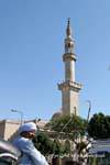 Horse carriage driver and minaret in Luxor, Egypt.