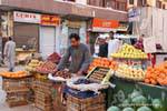 Merchant of fruit on a street in Luxor, Egypt.