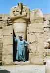 Pharaoh headless statue and keeps mustache, Karnak Temple, Egypt.