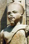 Statue of Amun in the face of Tutankhamun, Karnak Temple, Egypt.