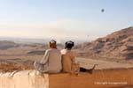 Meditation before the landscape and the remains of the temple of Mentuhotep II, Deir el-Bahari, Egypt.