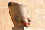 Colossus head off on a pedestal, Hatshepsut Temple, Egypt.