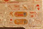 Cartridges and hieroglyphic symbols painted temple of Hatshepsut, Egypt.