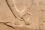 Elegance of Egyptian art, hands meet, Karnak, Egypt.