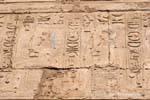 Color marks on sat holding the Pharaohs was scepter, emblem of the nome of Thebes, Karnak, Egypt.