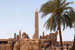 The palm and obelisks, archaeological site of Karnak, Egypt.