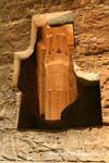 Indiscretion column view through a hole in the wall, Luxor Temple, Egypt.