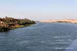 Majesty of the Nile river, between greenery and desert, Egypt.